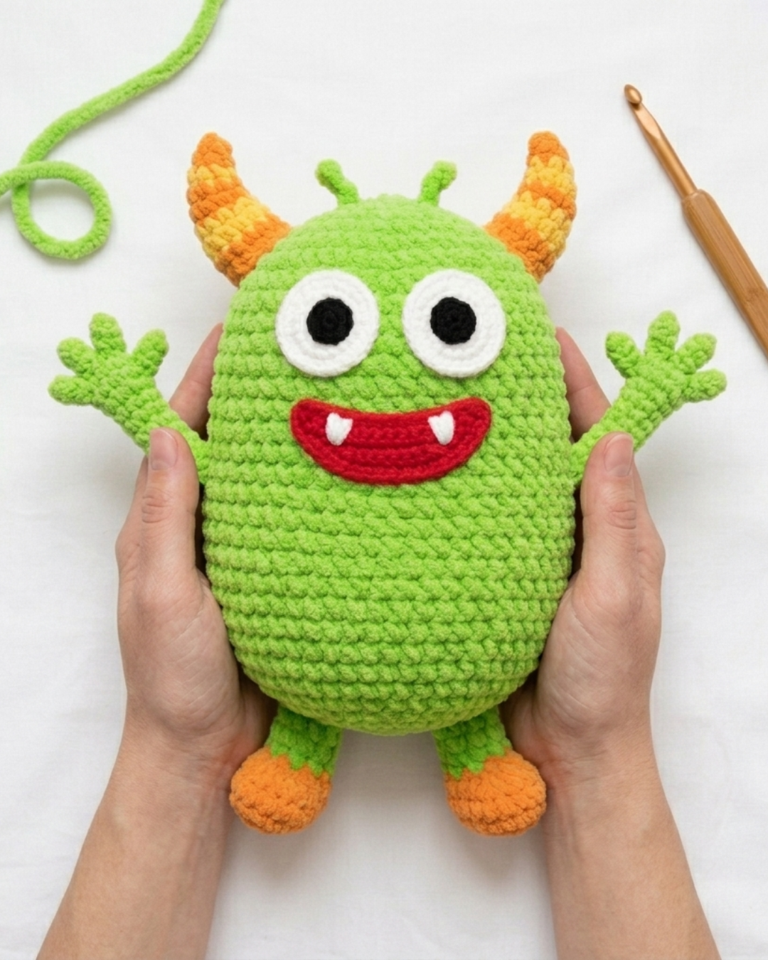 Green Doodle held in hands